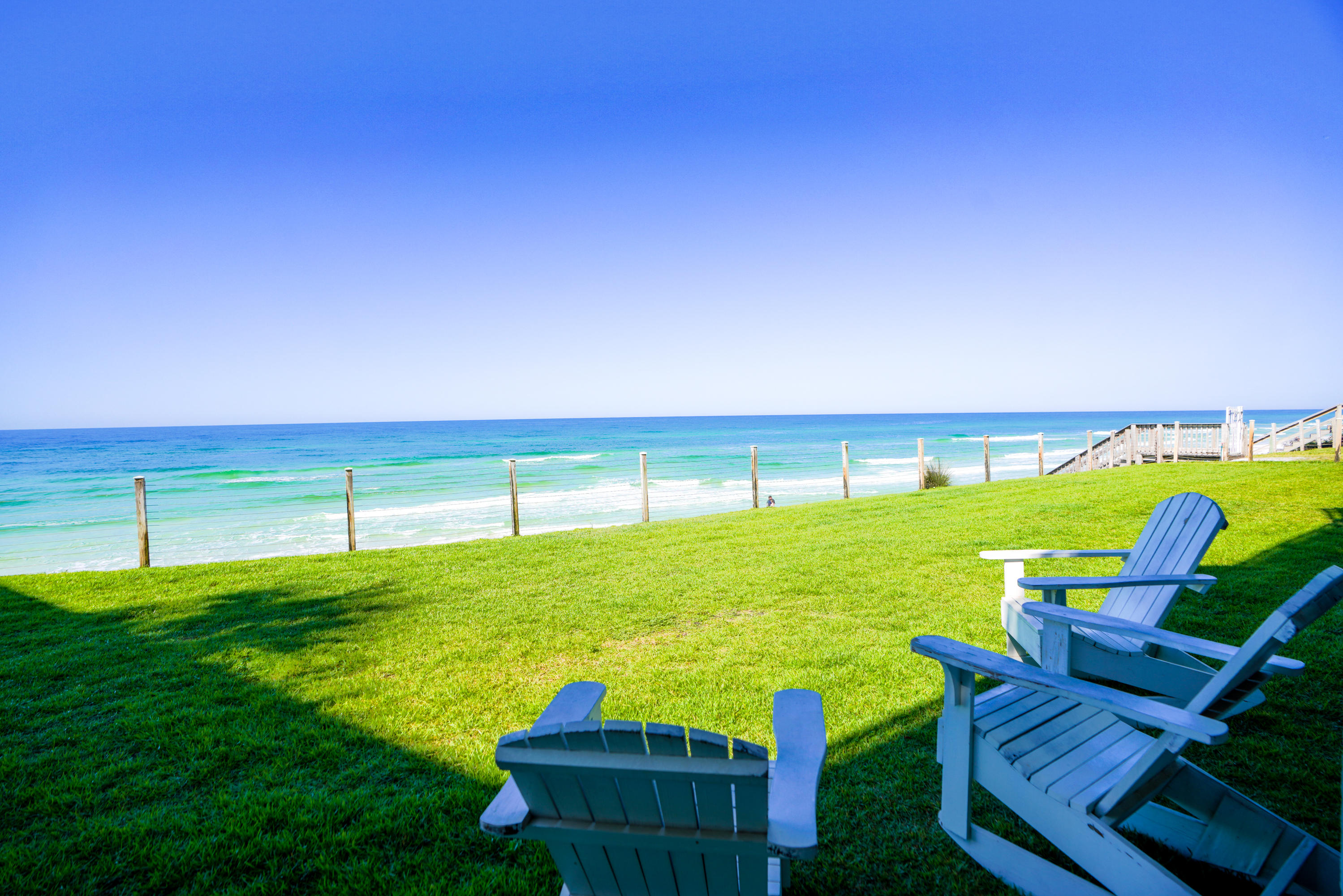 214 Blue Mountain Road, Unit 112 Santa Rosa Beach, FL 32459 - Photo 1 of 19 a view of yard with swimming pool and seating area