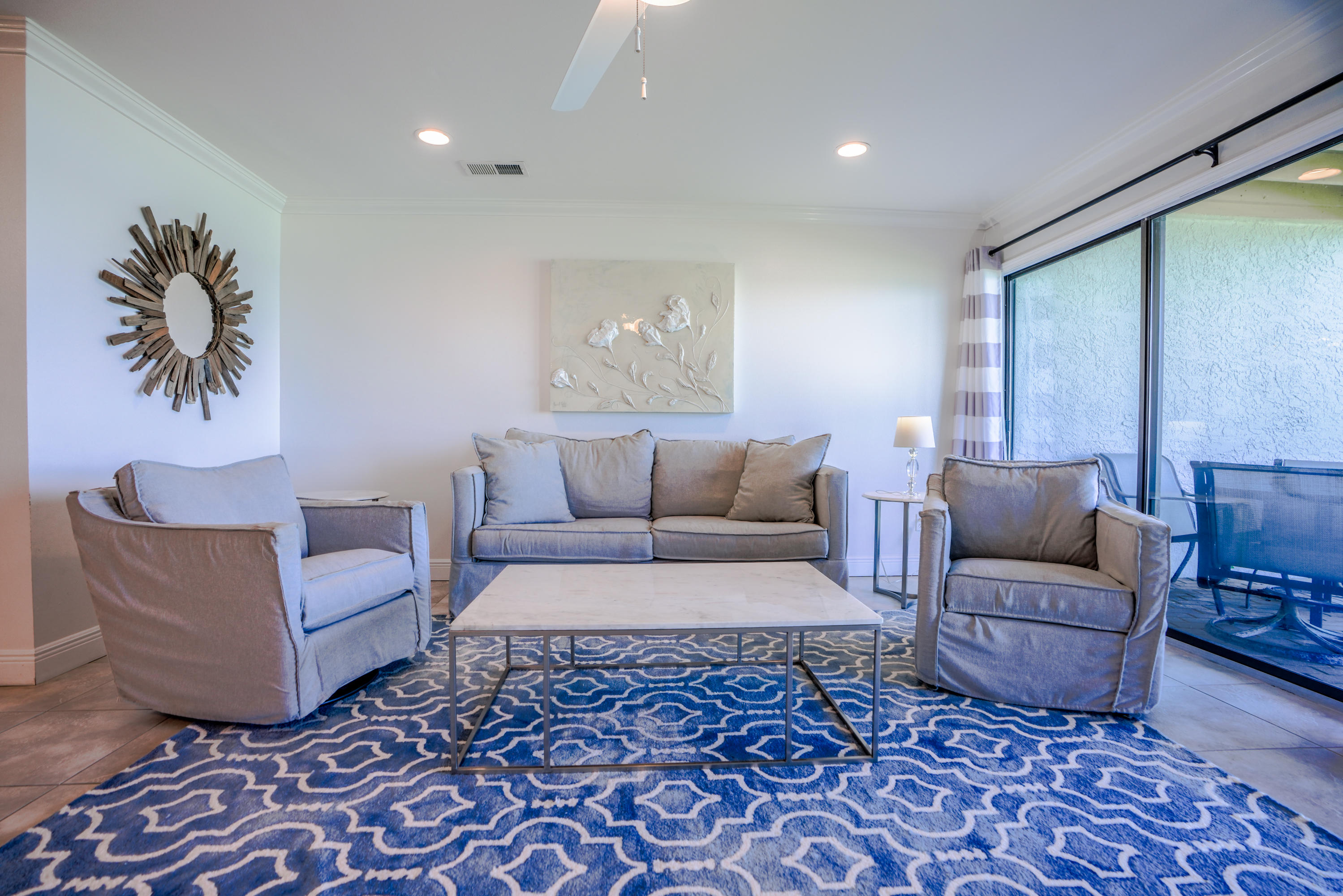 214 Blue Mountain Road, Unit 112 Santa Rosa Beach, FL 32459 - Photo 7 of 19 a living room with furniture and a rug