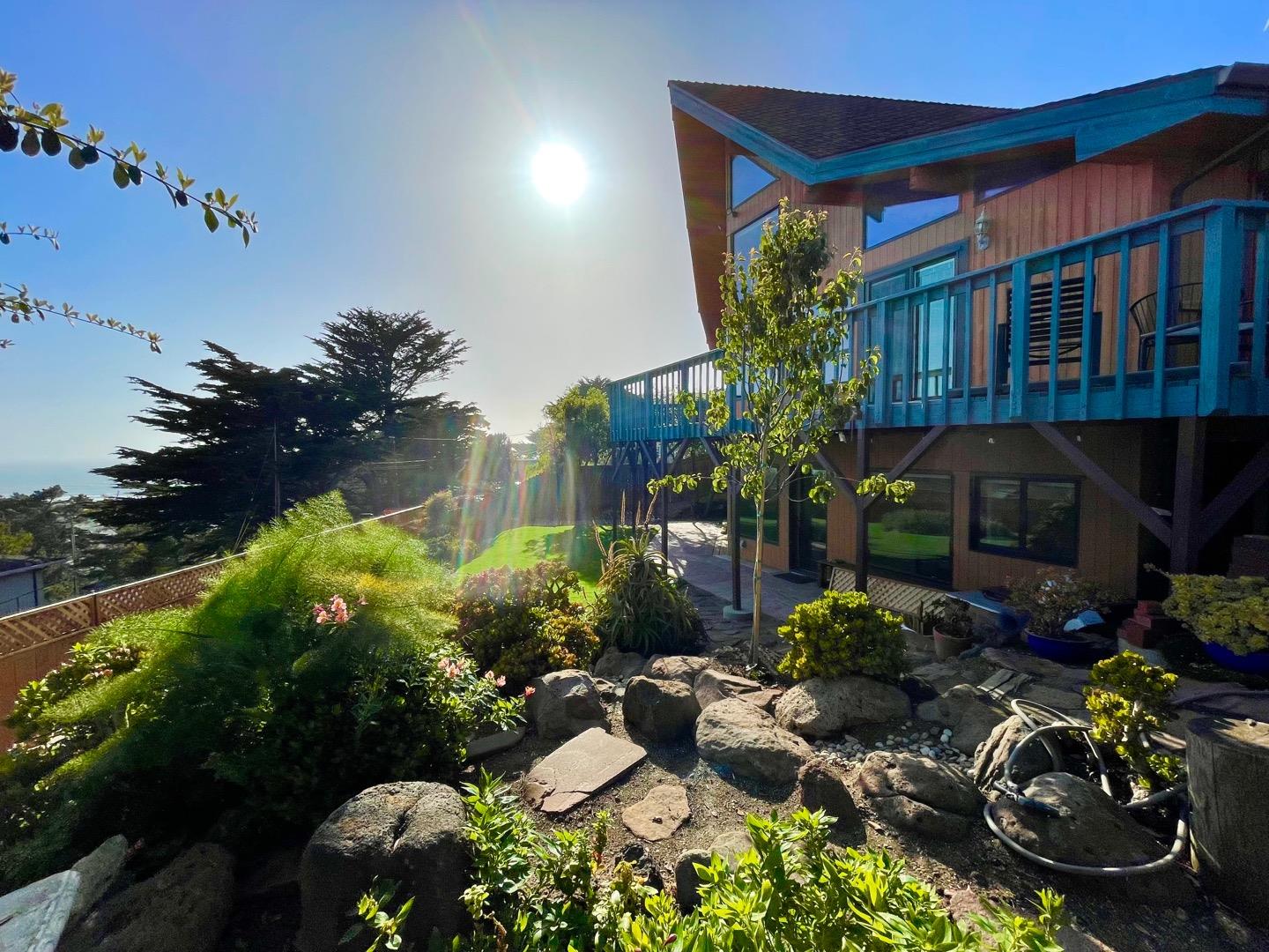 490 Talbot Avenue Pacifica, CA 94044 - Photo 2 of 33 a front view of a house with a yard
