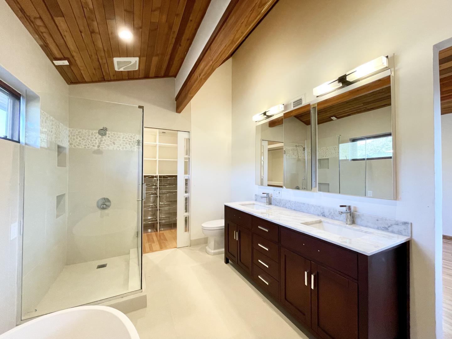 490 Talbot Avenue Pacifica, CA 94044 - Photo 16 of 33 a bathroom with a double vanity sink mirror double shower and a bathtub