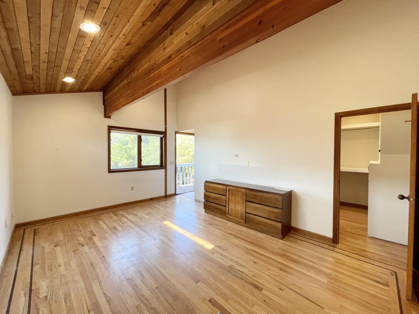 490 Talbot Avenue Pacifica, CA 94044 - Photo 18 of 33 a view of an empty room with wooden floor and a window