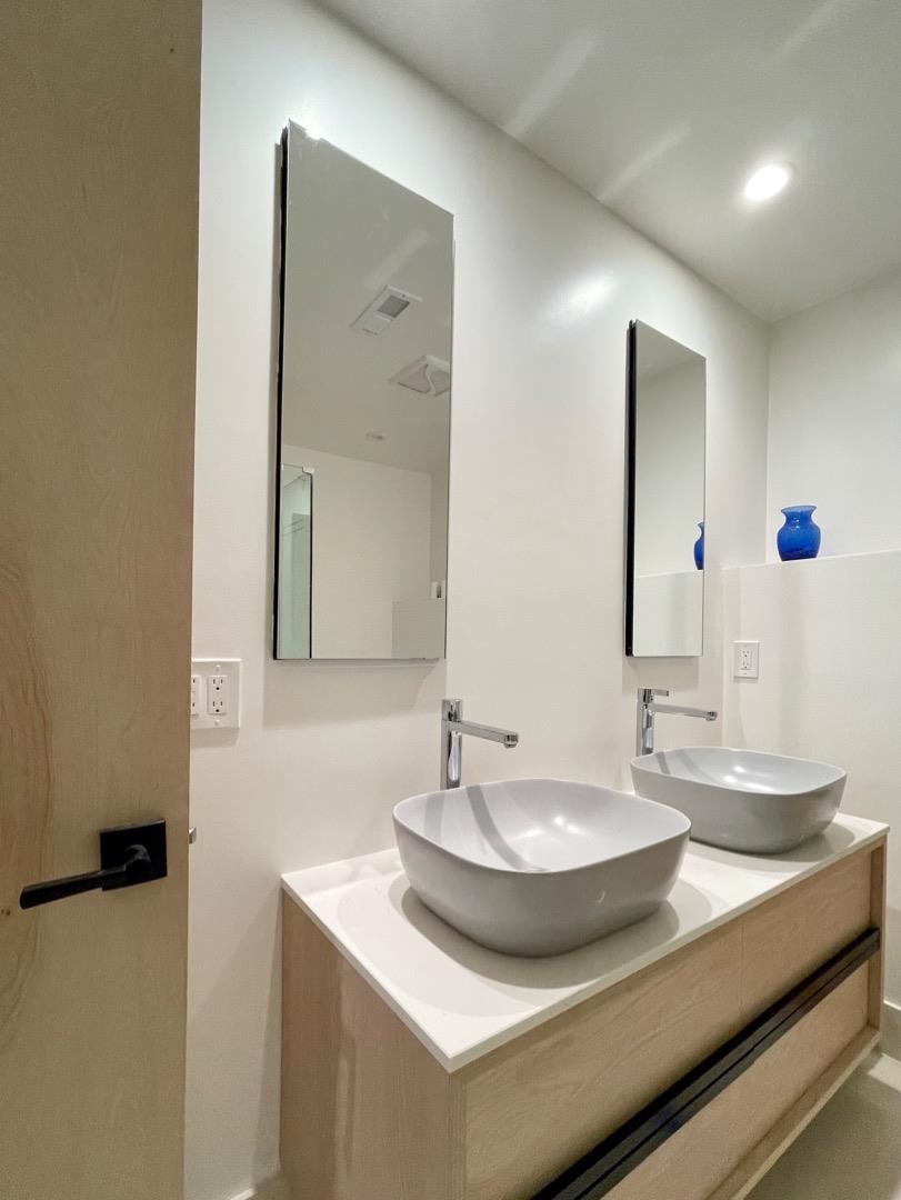 490 Talbot Avenue Pacifica, CA 94044 - Photo 28 of 33 a bathroom with a sink and a mirror