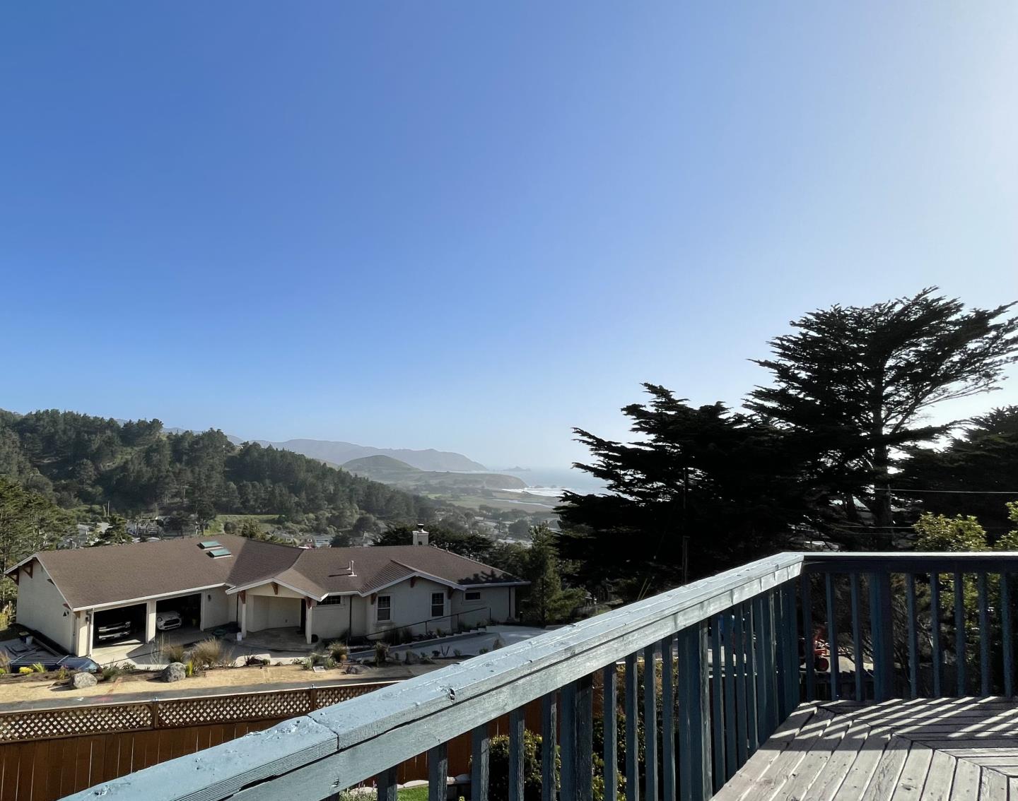 490 Talbot Avenue Pacifica, CA 94044 - Photo 8 of 33 a balcony with wooden floor and city view
