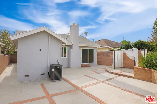 a front view of a house with a garage