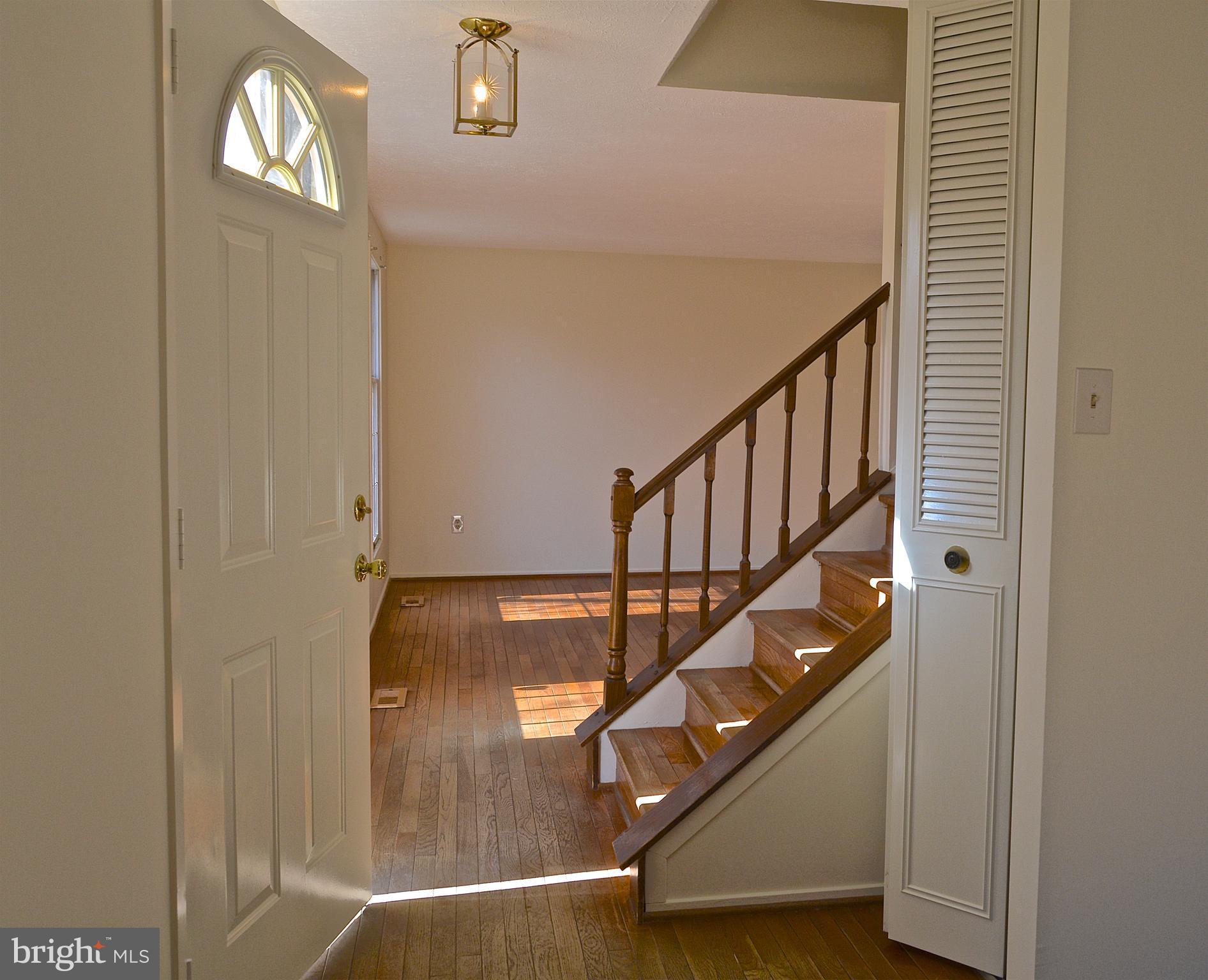 5751 Heming Avenue Springfield, VA 22151 - Photo 2 of 22 Bright Foyer w. convenient Coat-closet