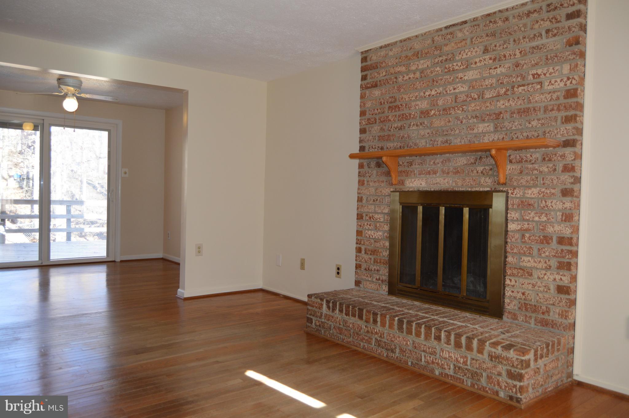 5751 Heming Avenue Springfield, VA 22151 - Photo 9 of 22 Cozy up next to this wood-burning fireplace !
