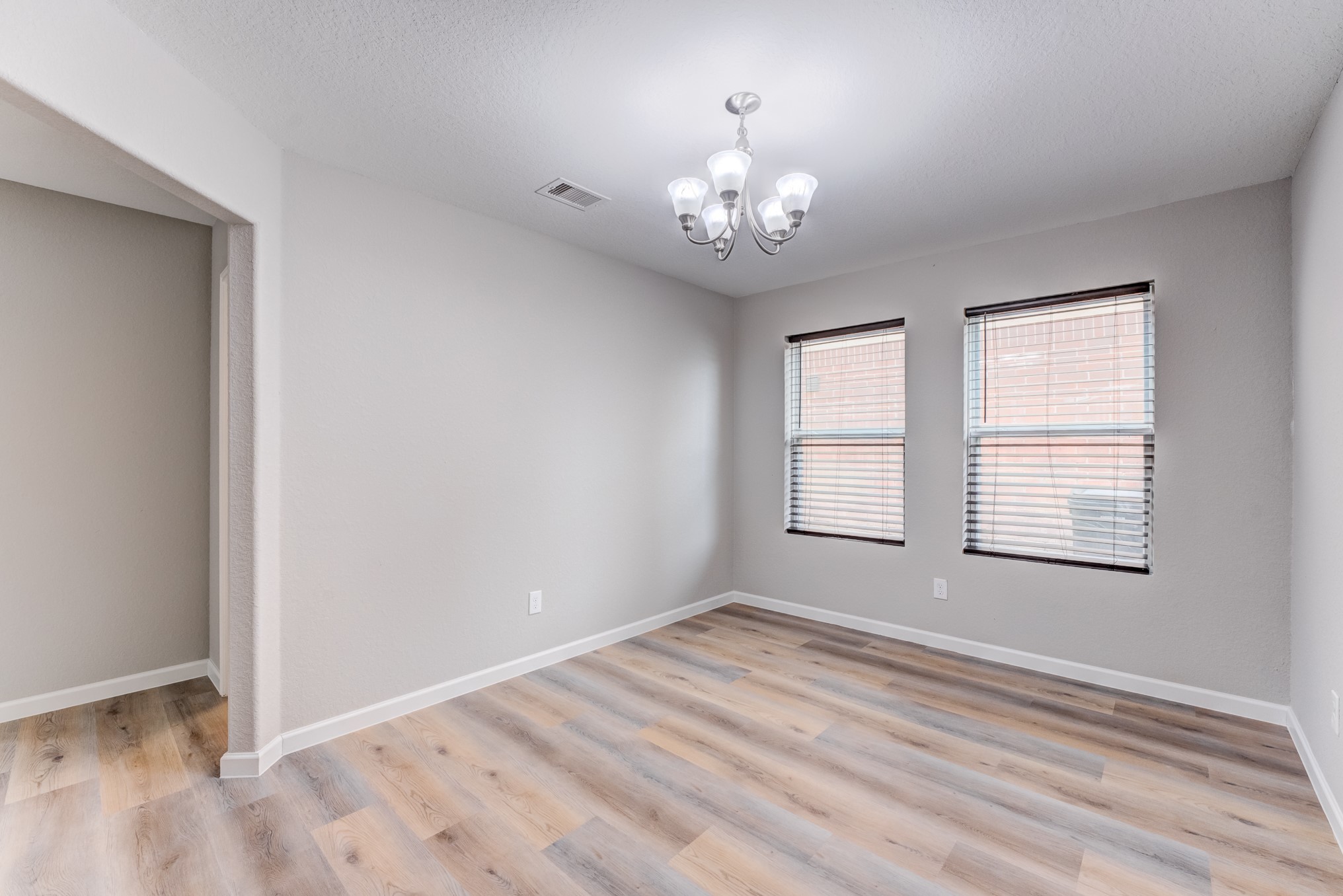 8038 Narrow Brook Way Houston, TX 77016 - Photo 22 of 50 a view of an empty room with a window