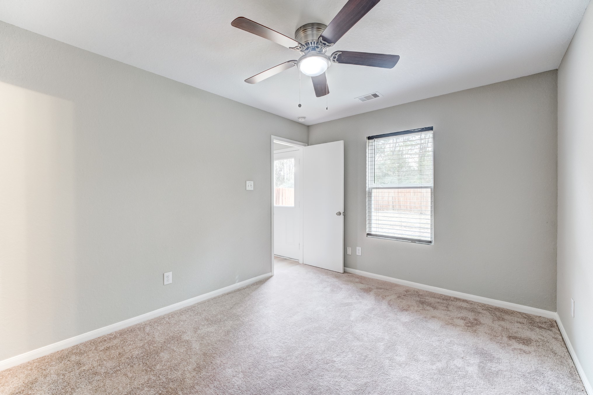 8038 Narrow Brook Way Houston, TX 77016 - Photo 27 of 50 a view of an empty room with a window