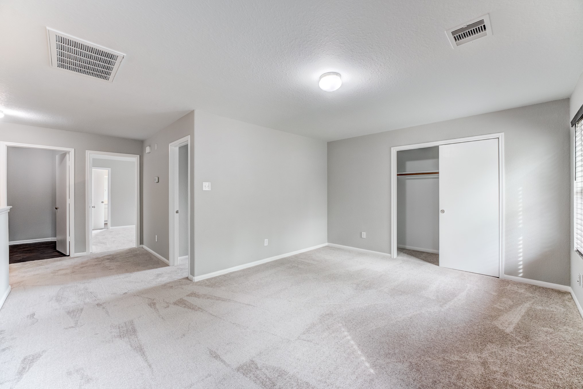 8038 Narrow Brook Way Houston, TX 77016 - Photo 29 of 50 an empty room with a natural light