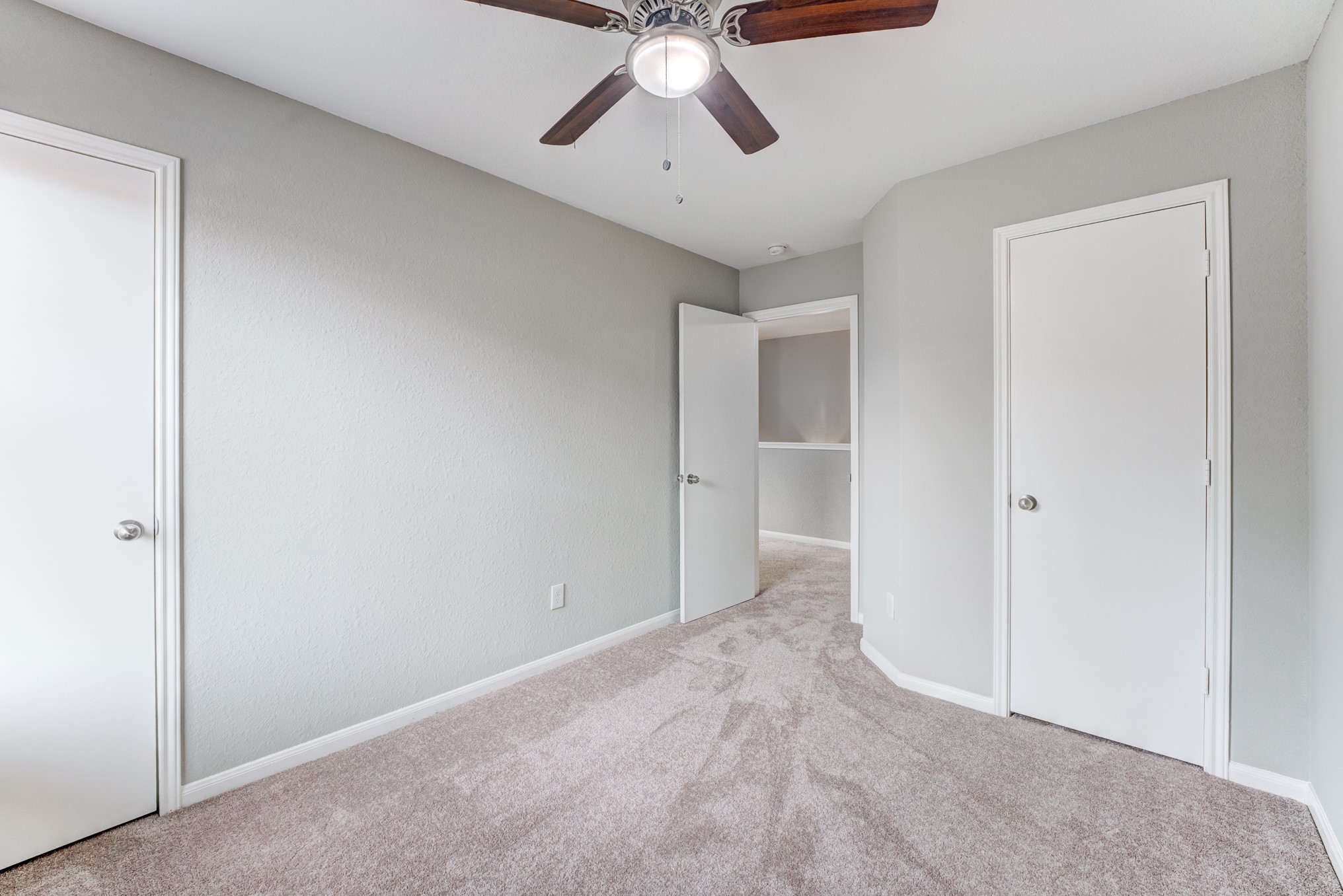 8038 Narrow Brook Way Houston, TX 77016 - Photo 32 of 50 a view of empty room with window and ceiling fan
