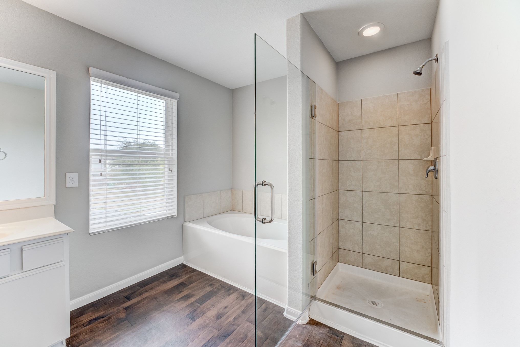 8038 Narrow Brook Way Houston, TX 77016 - Photo 39 of 50 a bathroom with a bathtub and shower