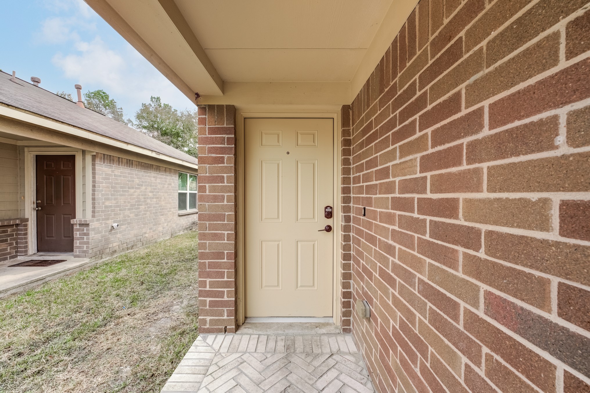8038 Narrow Brook Way Houston, TX 77016 - Photo 4 of 50 a view of a brick house with a large window