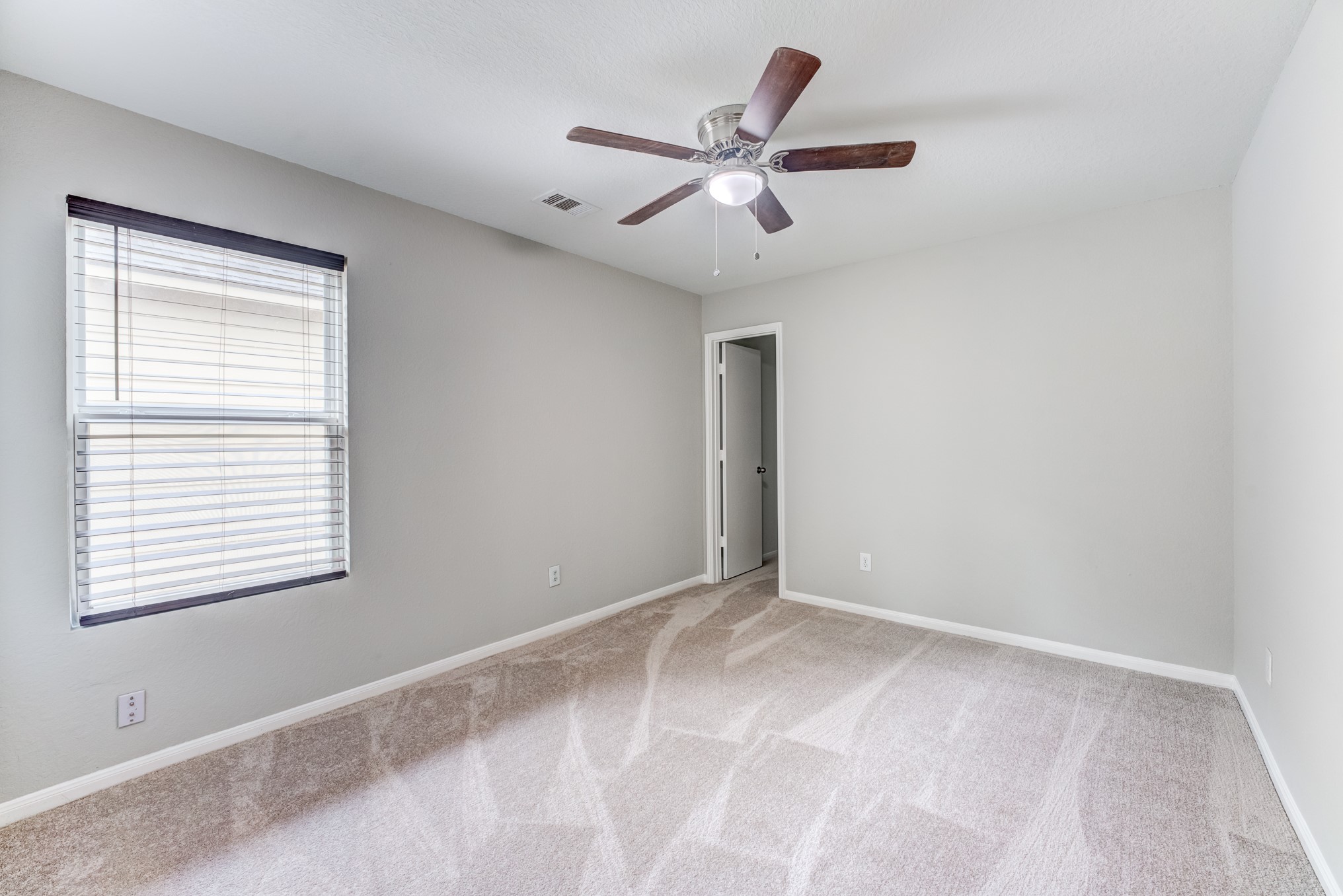 8038 Narrow Brook Way Houston, TX 77016 - Photo 41 of 50 a view of an empty room with a window