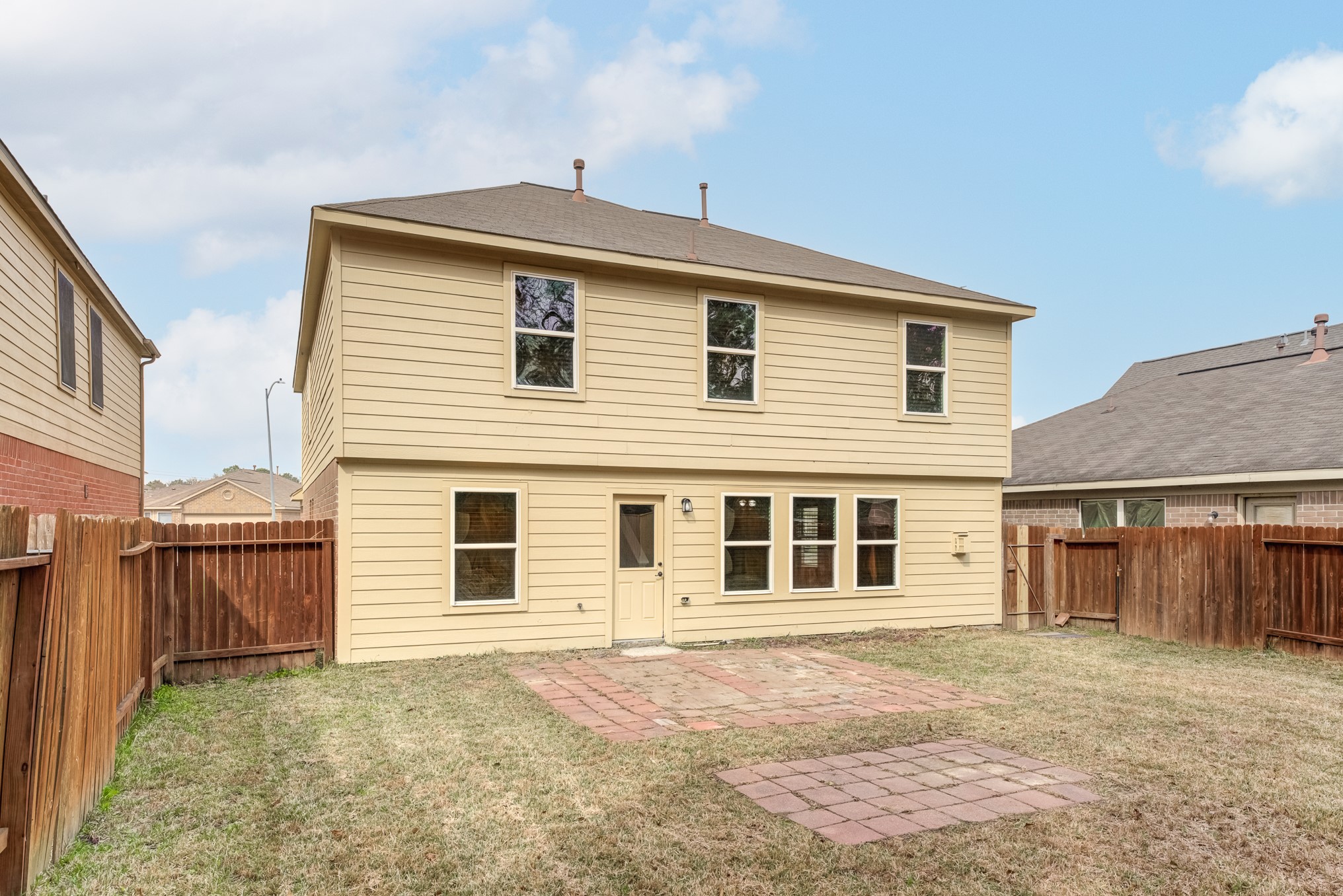 8038 Narrow Brook Way Houston, TX 77016 - Photo 47 of 50 a front view of a house with a yard