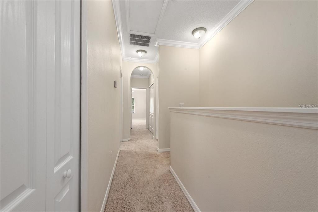 5957 Strada Capri Way Orlando, FL 32835 - Photo 14 of 20 a view of a bathroom from a hallway