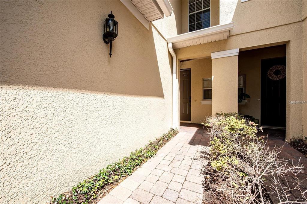 5957 Strada Capri Way Orlando, FL 32835 - Photo 2 of 20 a view of a entryway of the house