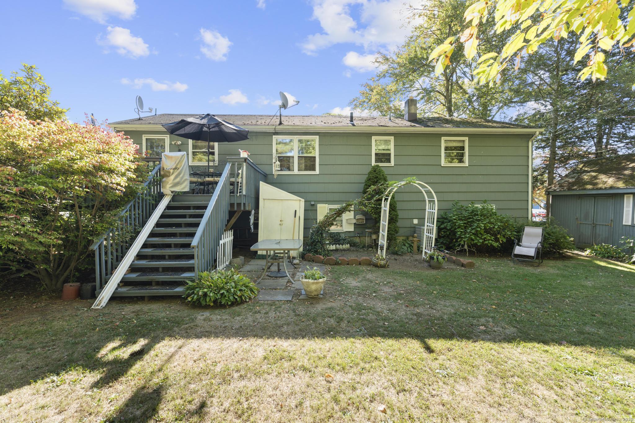 23 Meadow Brook Road West Haven, CT 06516 - Photo 6 of 39 a view of a house with a yard