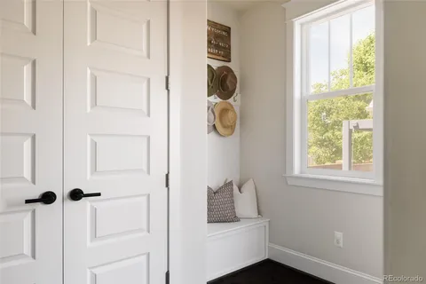 a bathroom with a window and a shower