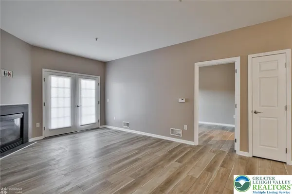 a view of an empty room and window