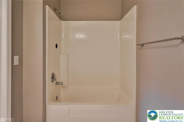 a view of a building with a yard