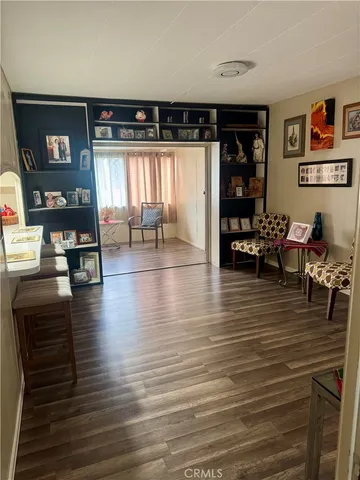 a bedroom with double bed and a window