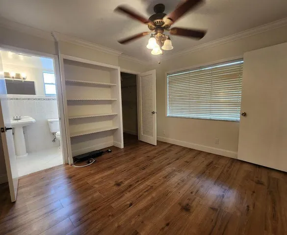 a view of room and wooden floor