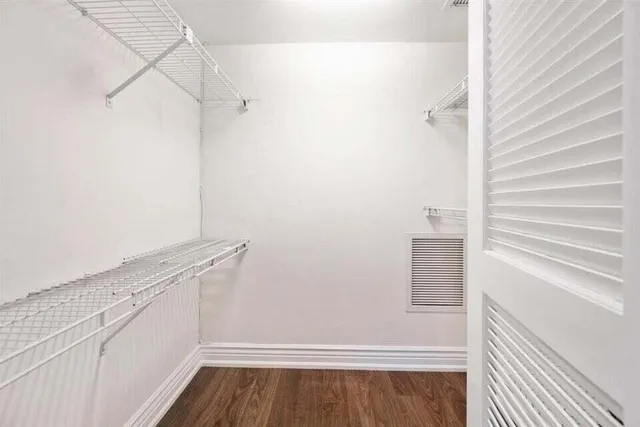 a view of a room with racks on the wall