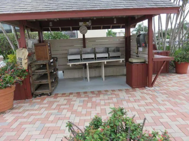 a view of a chairs and table in the patio