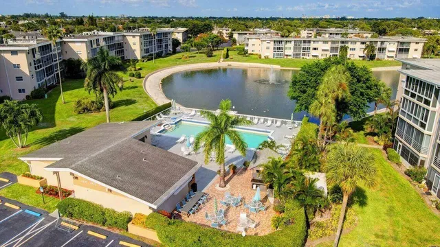 a view of a swimming pool with a patio