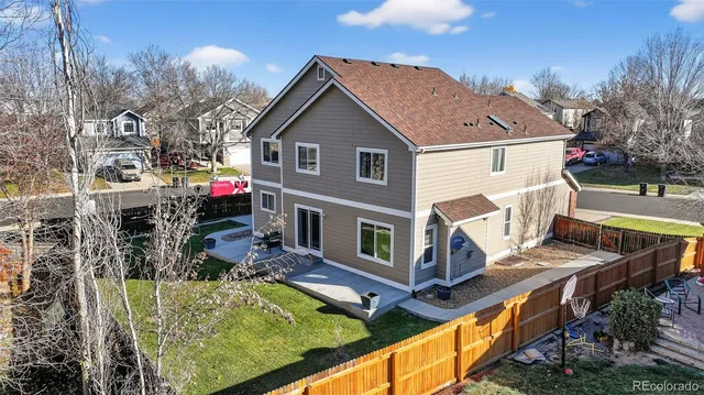a view of house with swimming pool