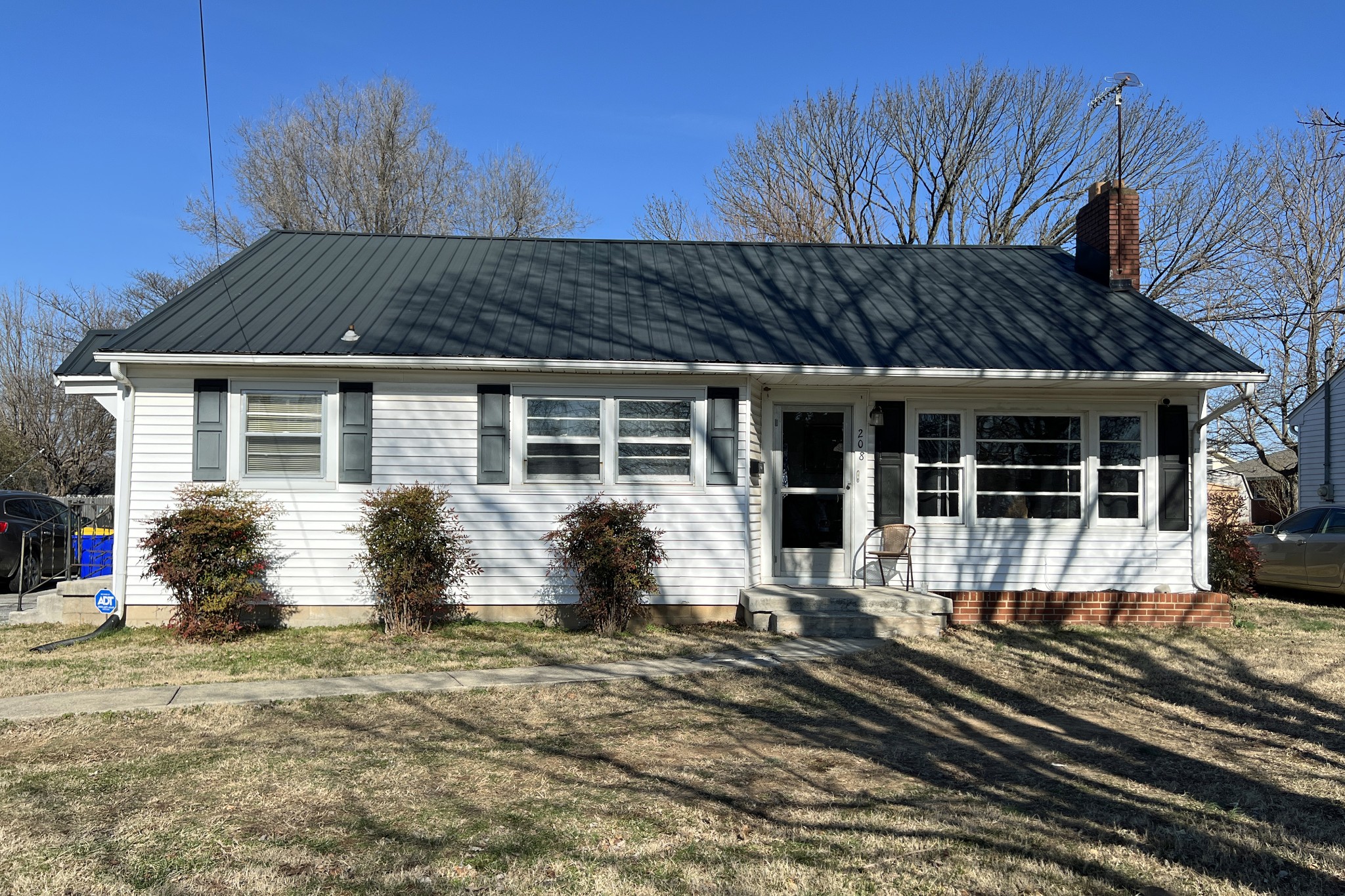 a front view of a house with yard