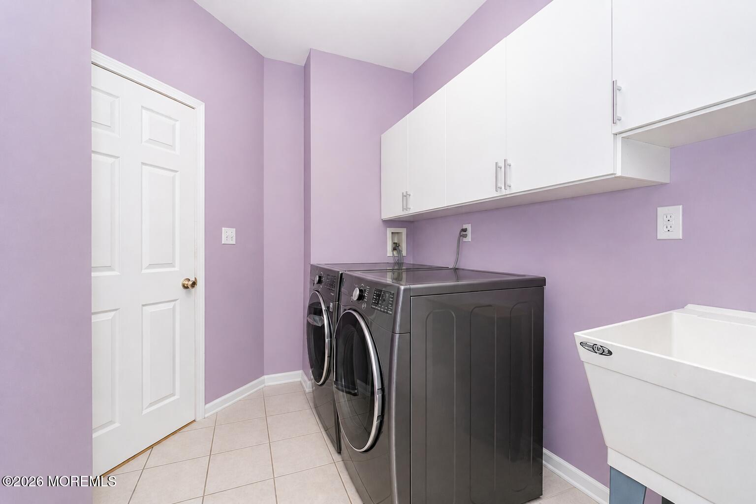 315 Wedgewood Road Morganville, NJ 07751 - Photo 37 of 37 a utility room with dryer and washer