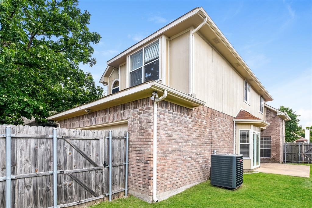 2425 Ithaca Drive Mesquite, TX 75181 - Photo 15 of 17 a front view of a house with a yard