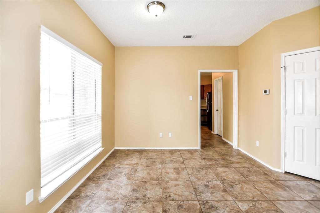 2425 Ithaca Drive Mesquite, TX 75181 - Photo 10 of 17 a view of a room with a large window