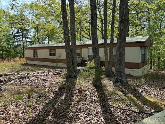2319 West Perch Road Monroe, VA 24574 - Photo 27 of 50 a backyard of a house with lots of green space