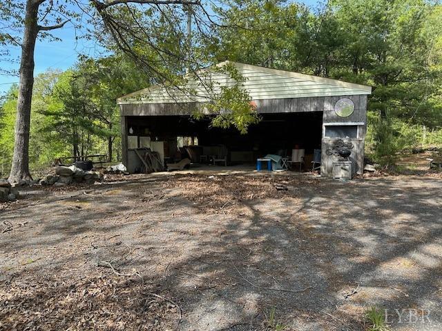 2319 West Perch Road Monroe, VA 24574 - Photo 32 of 50 a view of a house with backyard and sitting area