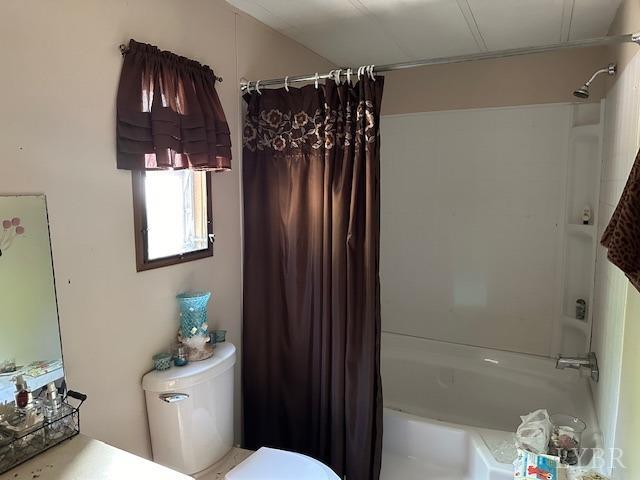 2319 West Perch Road Monroe, VA 24574 - Photo 8 of 50 a bathroom with a toilet and a shower curtain