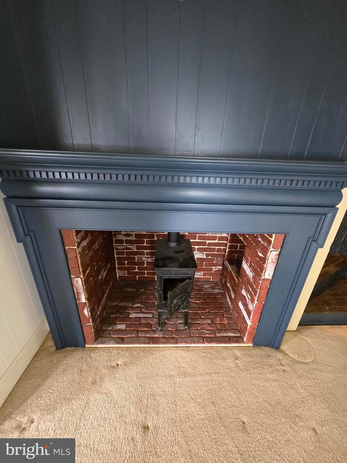 26431 Old State Road Crisfield, MD 21817 - Photo 18 of 25 a close view of a fireplace in a room