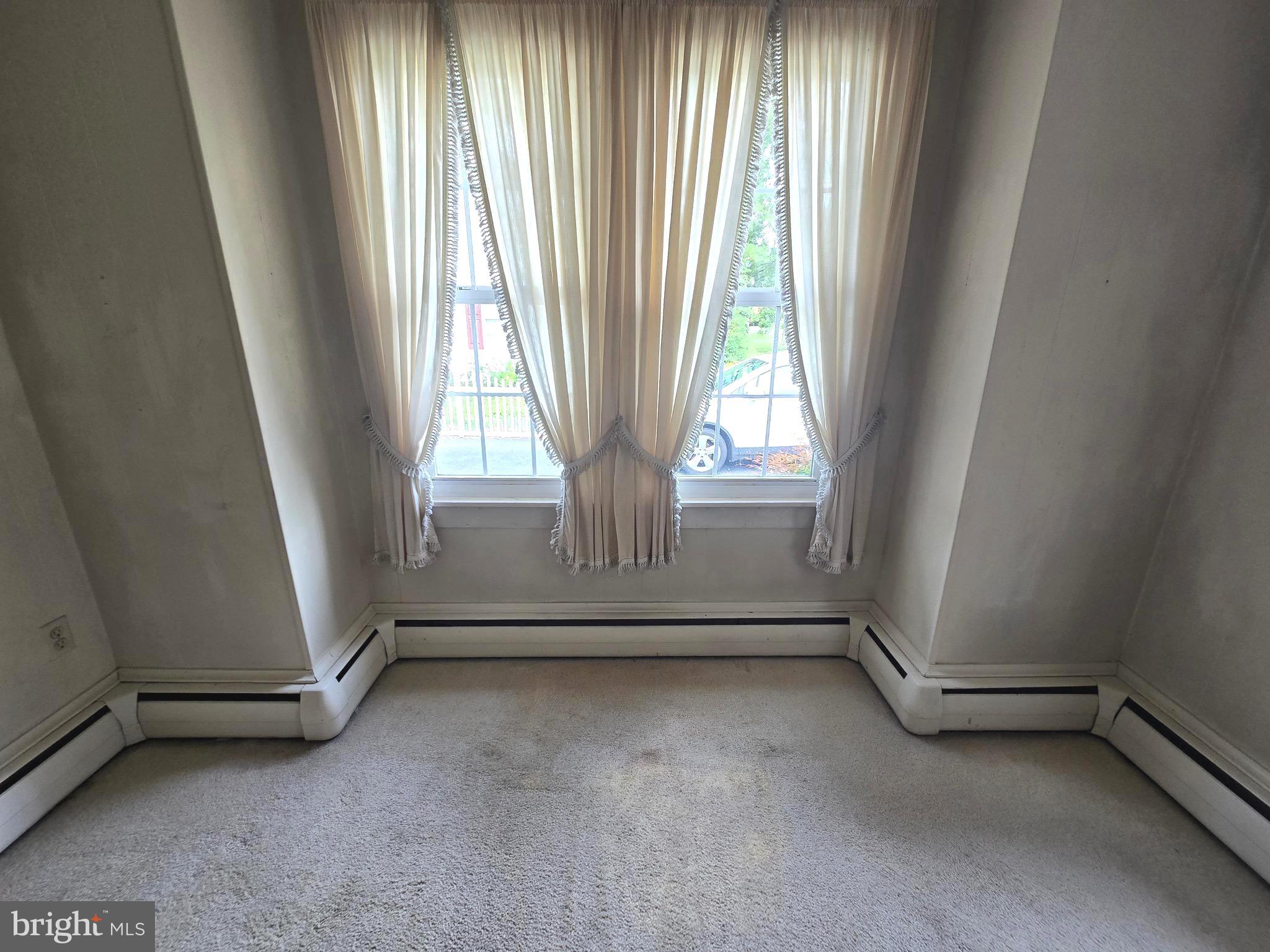 26431 Old State Road Crisfield, MD 21817 - Photo 23 of 25 an empty room with windows