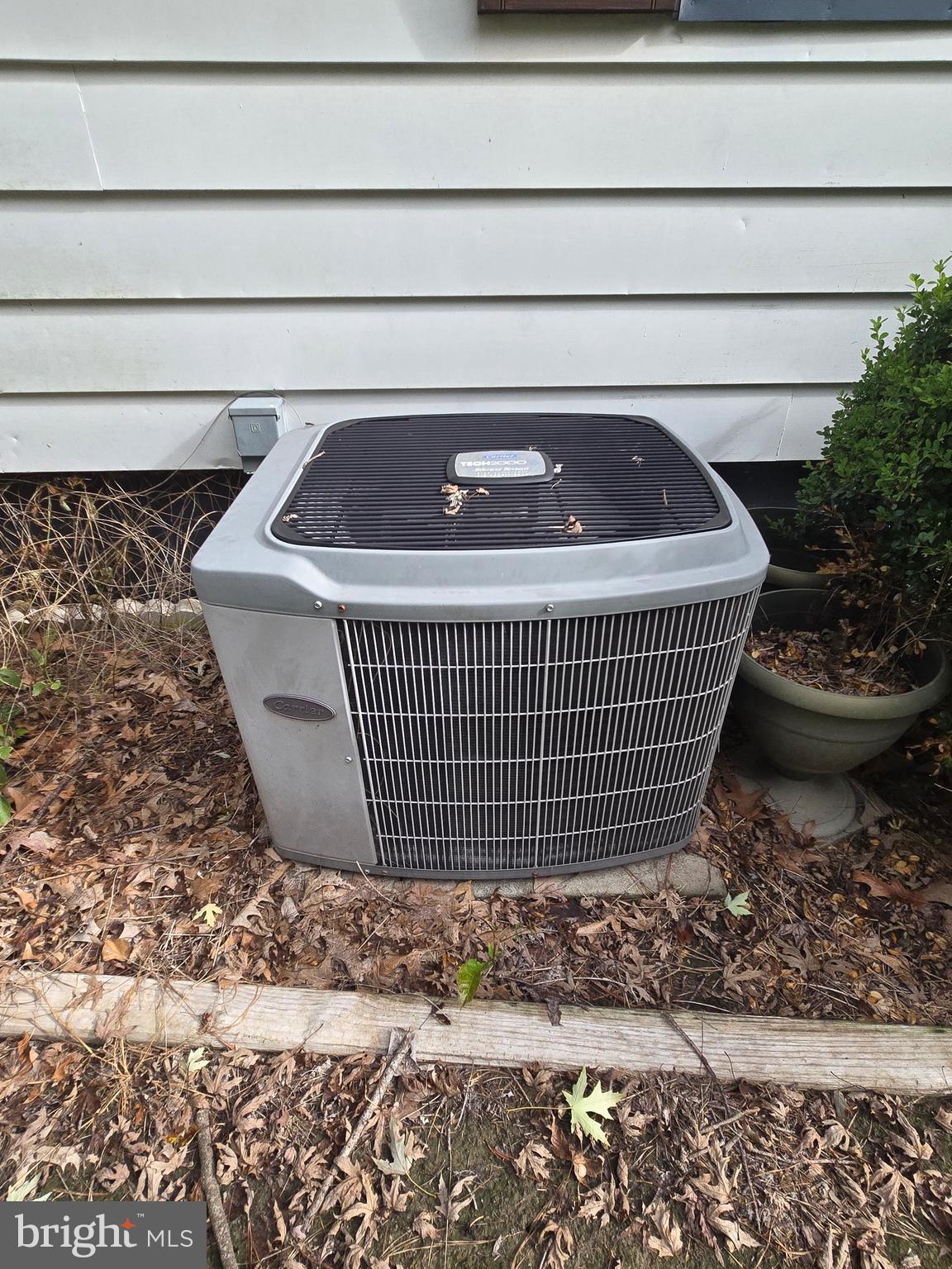 26431 Old State Road Crisfield, MD 21817 - Photo 24 of 25 a front view of a house with a garden