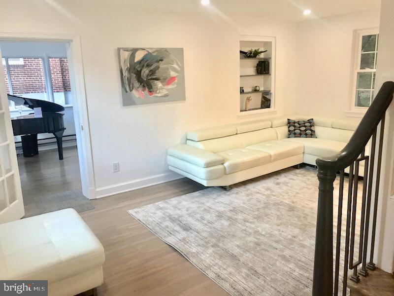 9905 Tenbrook Drive Silver Spring, MD 20901 - Photo 3 of 71 Living room opens to first floor master