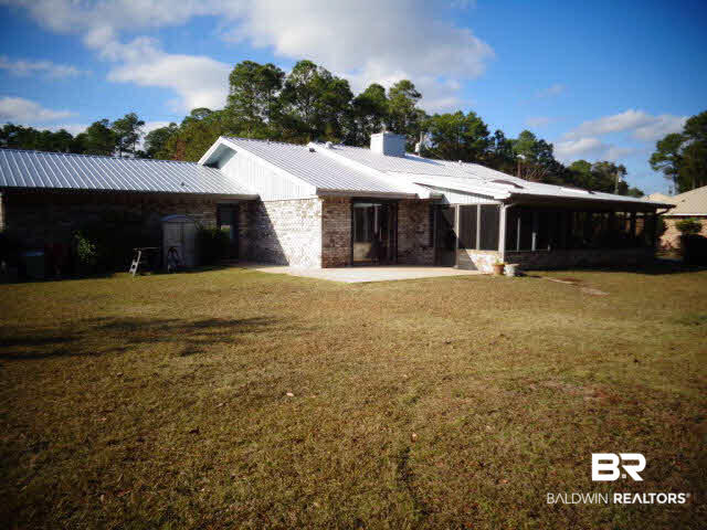 2804 Pine Ridge Drive Lillian, AL 36549 - Photo 32 of 39 Rear view of home.