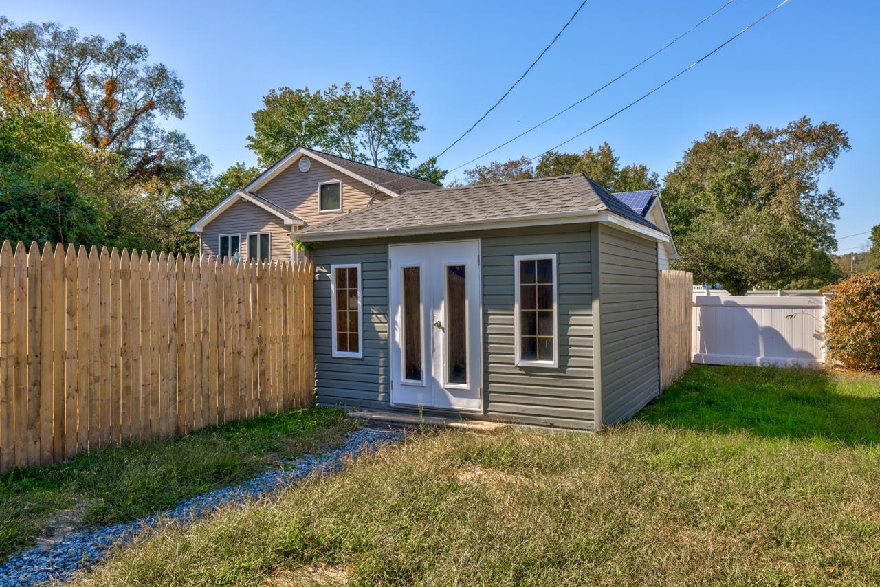 209 Breakwater Road Cape May, NJ 08204 - Photo 16 of 20 a front view of a house with a yard