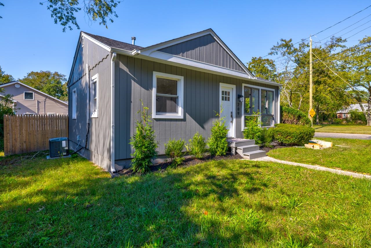 209 Breakwater Road Cape May, NJ 08204 - Photo 17 of 20 a view of a house with a yard and pathway