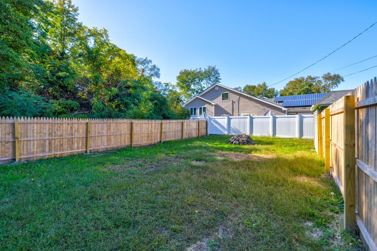 209 Breakwater Road Cape May, NJ 08204 - Photo 19 of 20 a view of a house with backyard and porch