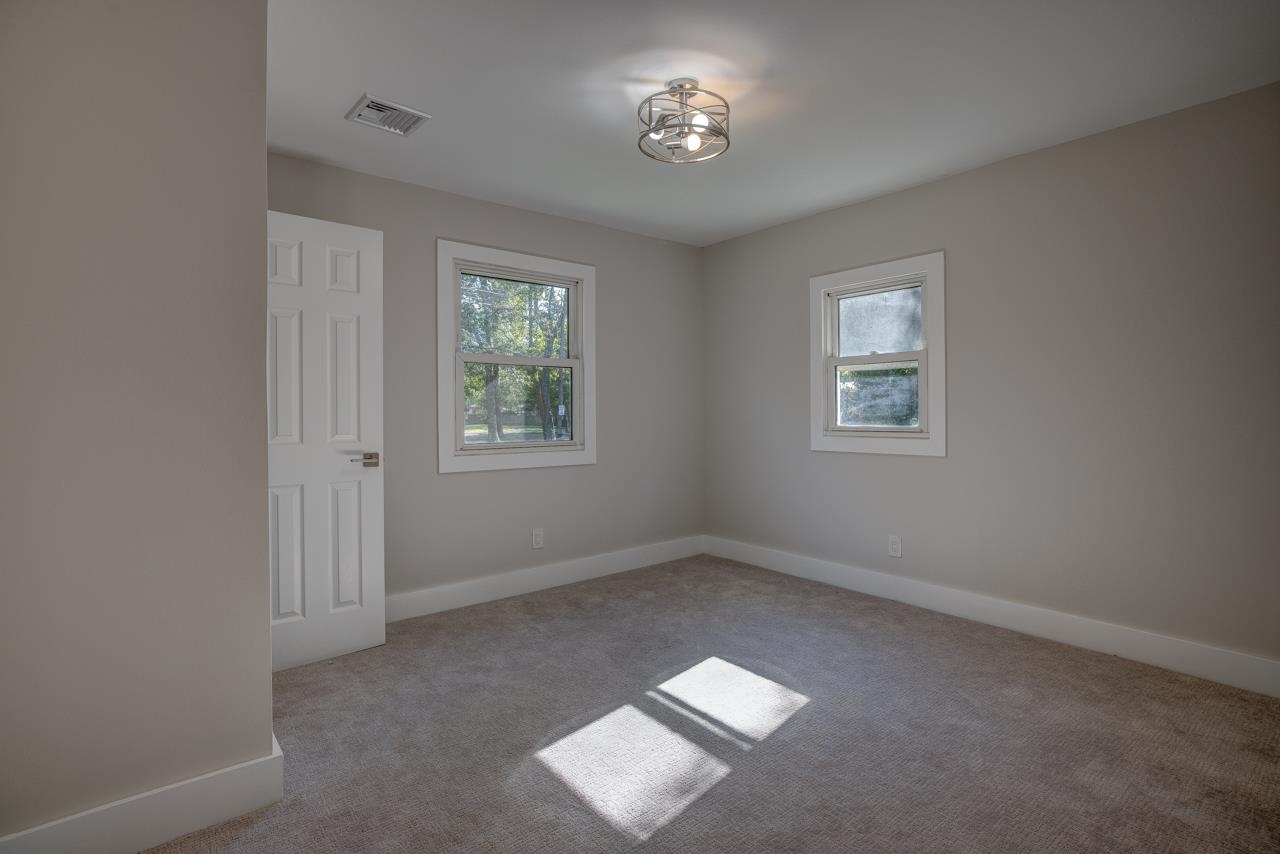 209 Breakwater Road Cape May, NJ 08204 - Photo 9 of 20 a view of empty room with windows