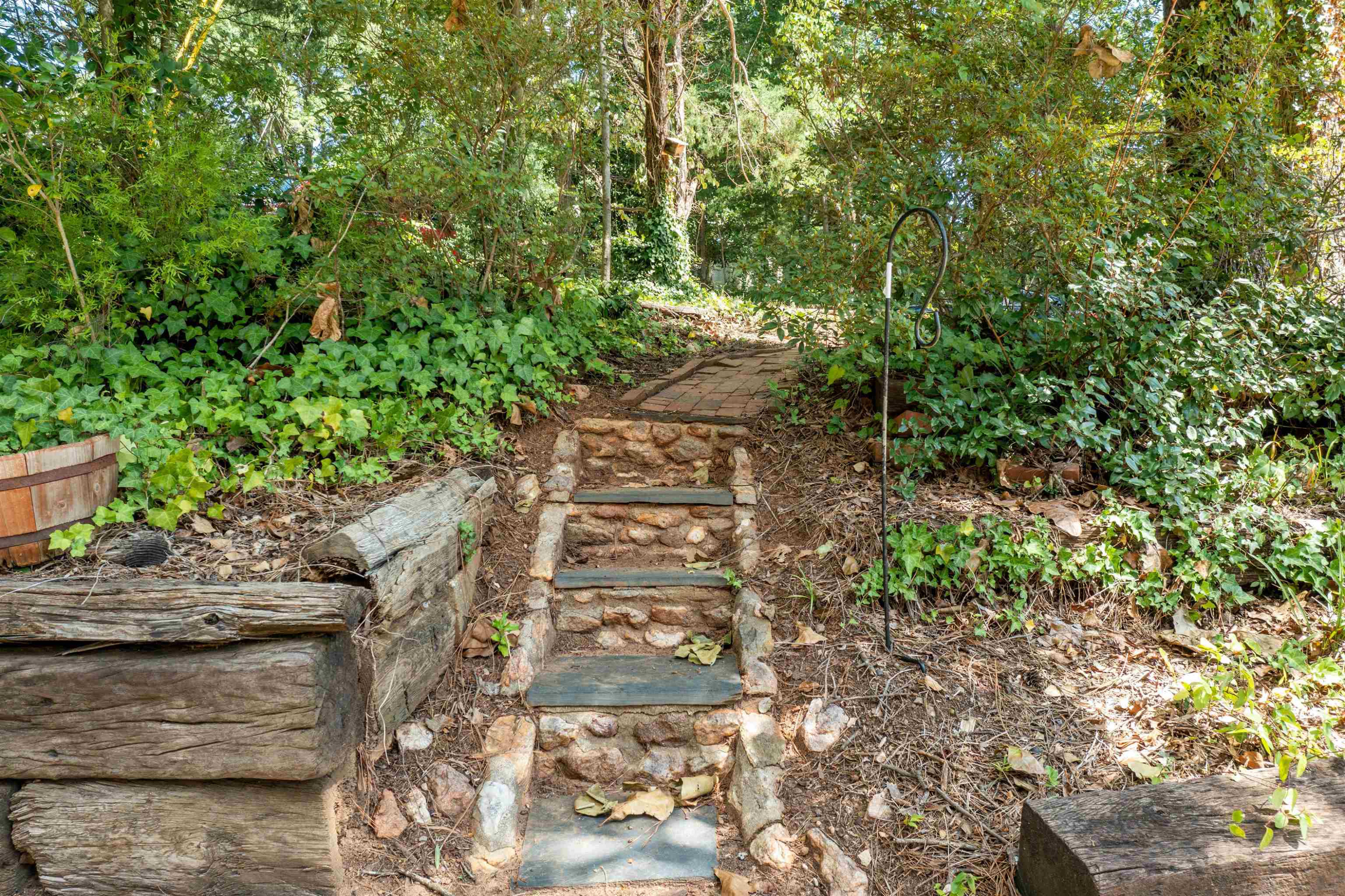 3207 Cyanne Circle Raleigh, NC 27606 - Photo 14 of 43 Steps leading out the front of the yard to even more space. A beautiful brick sidewalk just past. Front Yard