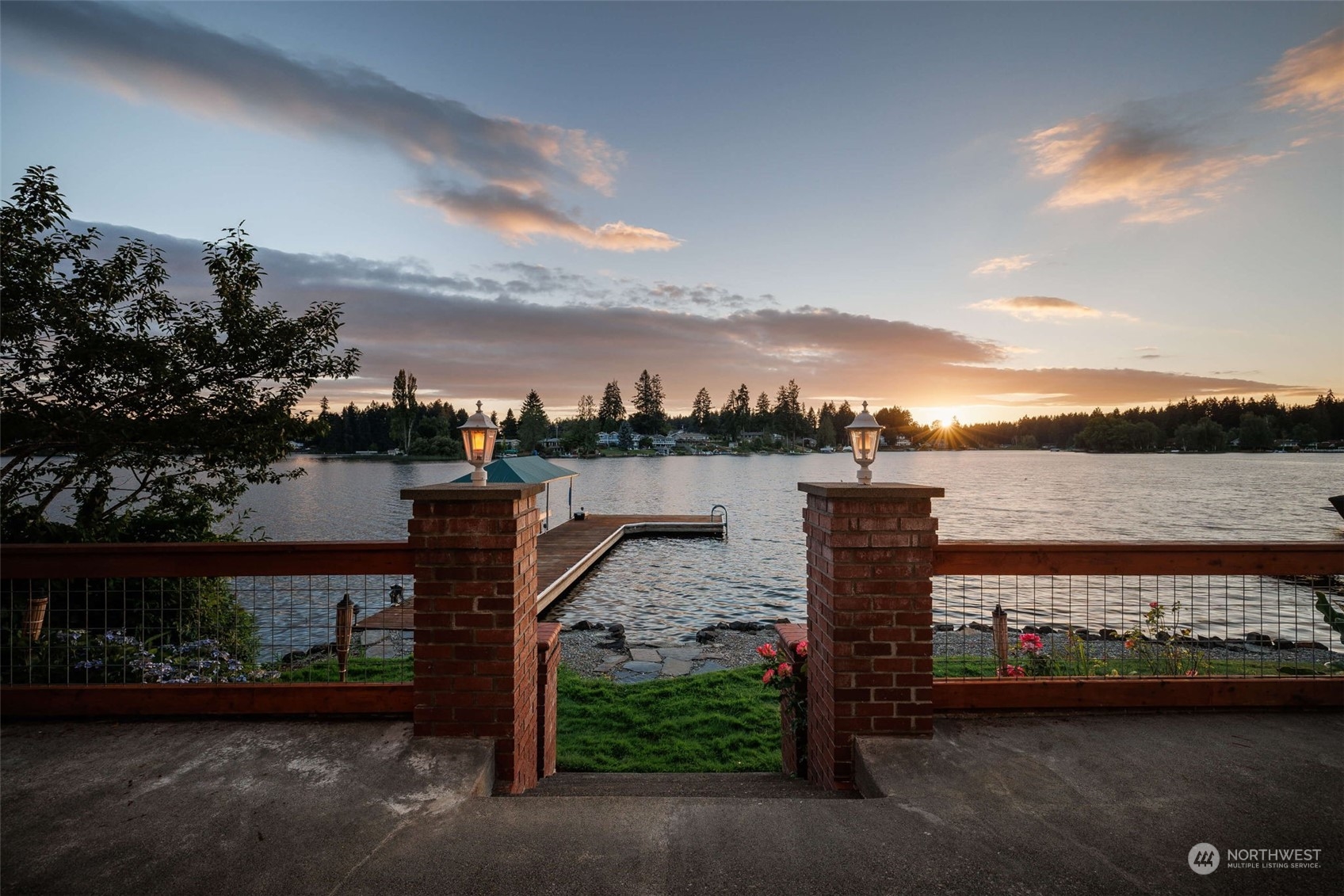 2513 Mayes Road Southeast Olympia, WA 98503 - Photo 1 of 30 a view of a lake with a building in the background
