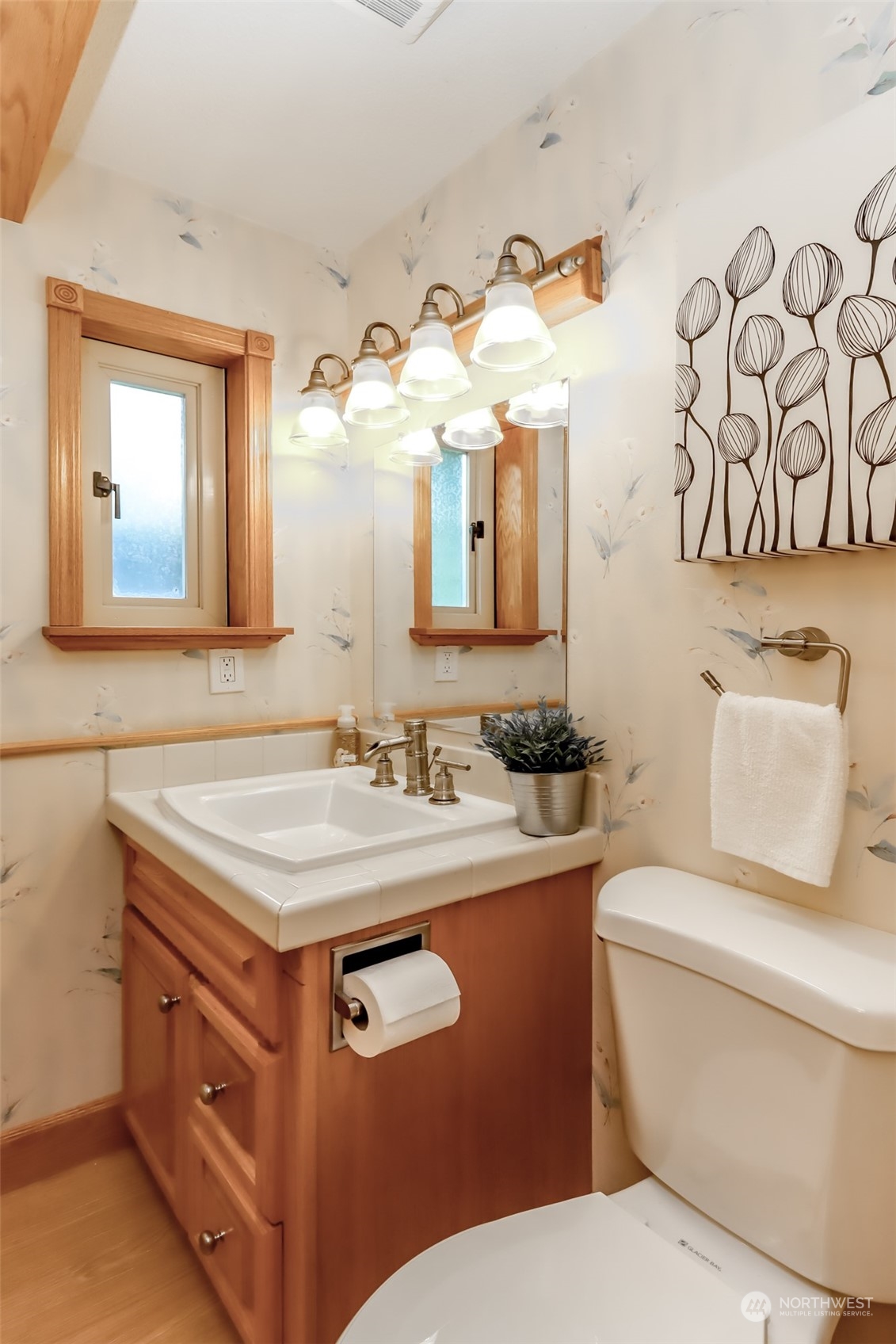 2513 Mayes Road Southeast Olympia, WA 98503 - Photo 12 of 30 a bathroom with a toilet sink and mirror