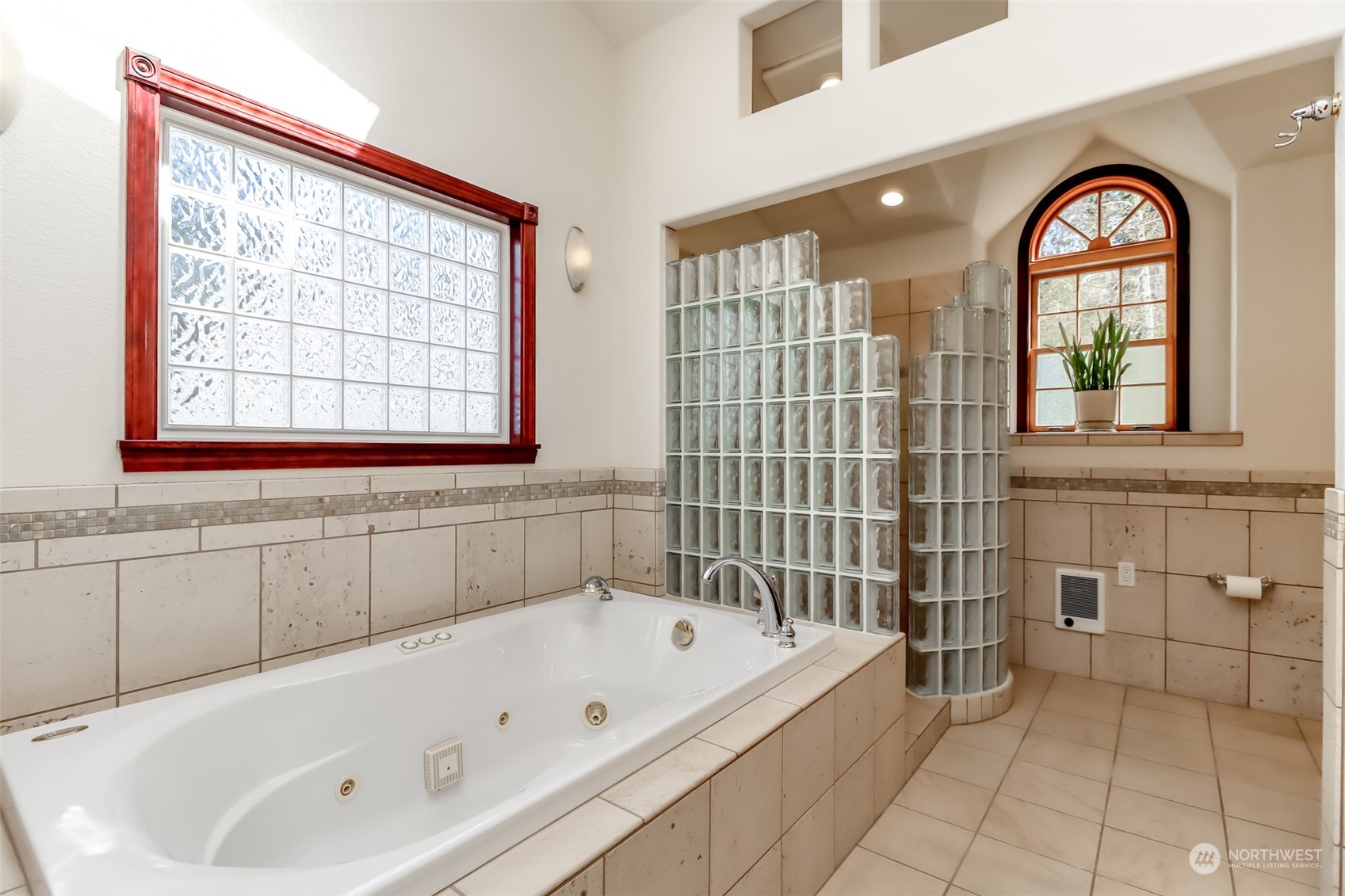 2513 Mayes Road Southeast Olympia, WA 98503 - Photo 19 of 30 a bathroom with a bathtub and a shower